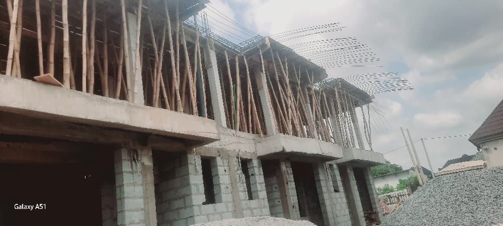 Building frame with timber formwork and reinforcement bars in progress